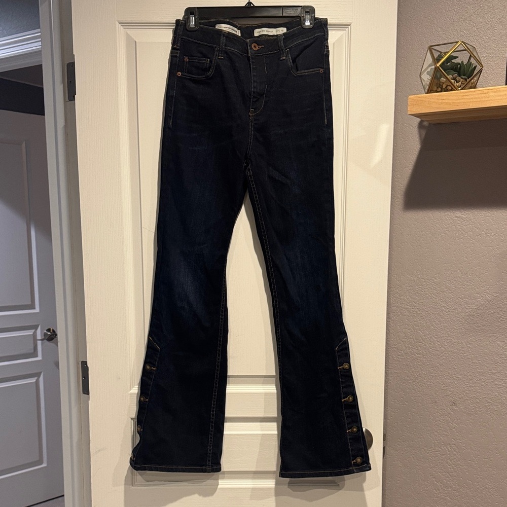 Pilcro Dark Indigo Flare Jeans with Snap Hem Detail